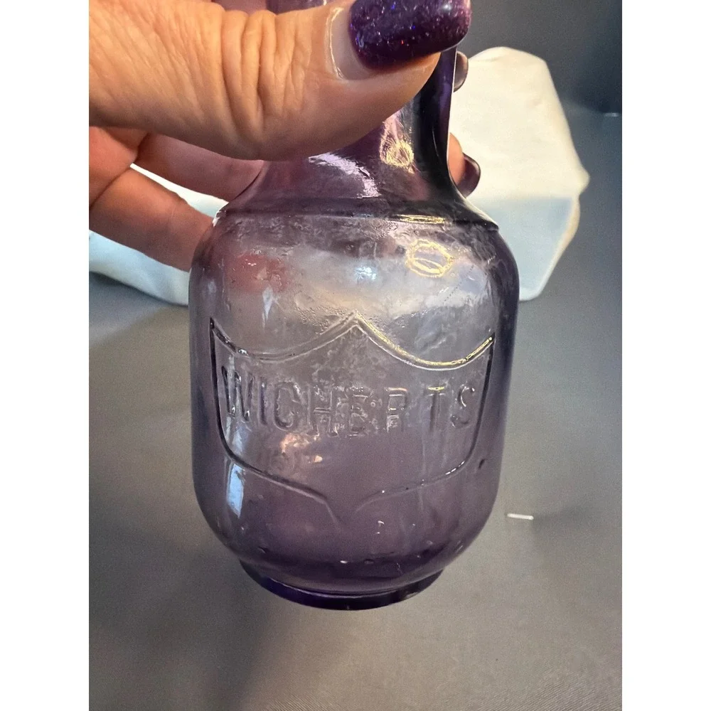 Vintage Wicherts Purple Amethyst Glass Bottle Embossed Shield Crest Apothecary